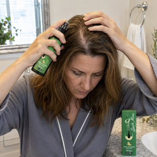 Step 1 — Part it down to the scalp